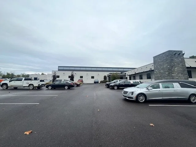 Parking lot with various specialty vehicles